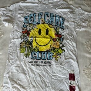 White Graphic Tee with Smiley Face and Floral Design